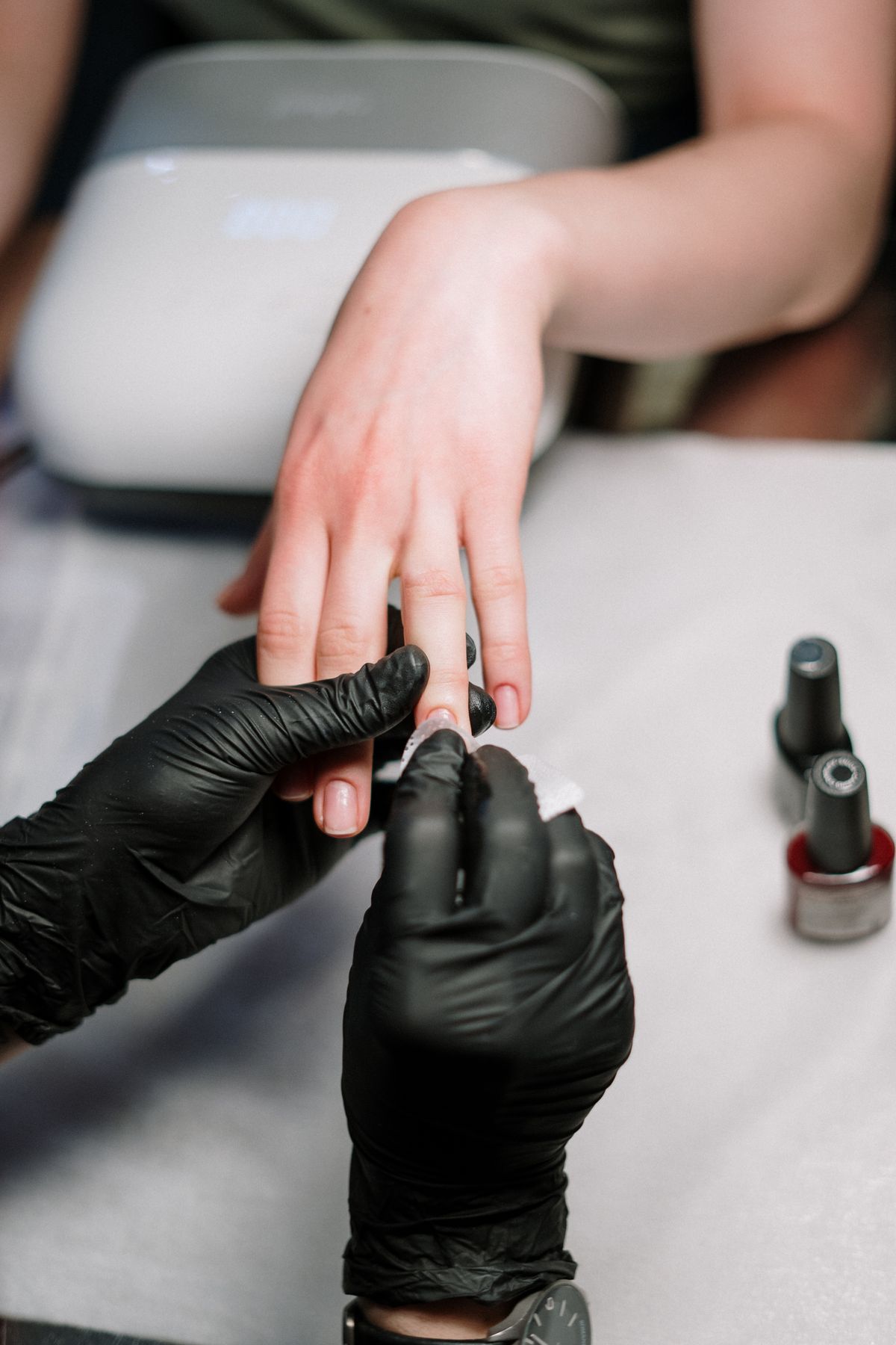 Gel manicure application at Sassy Nails Salon